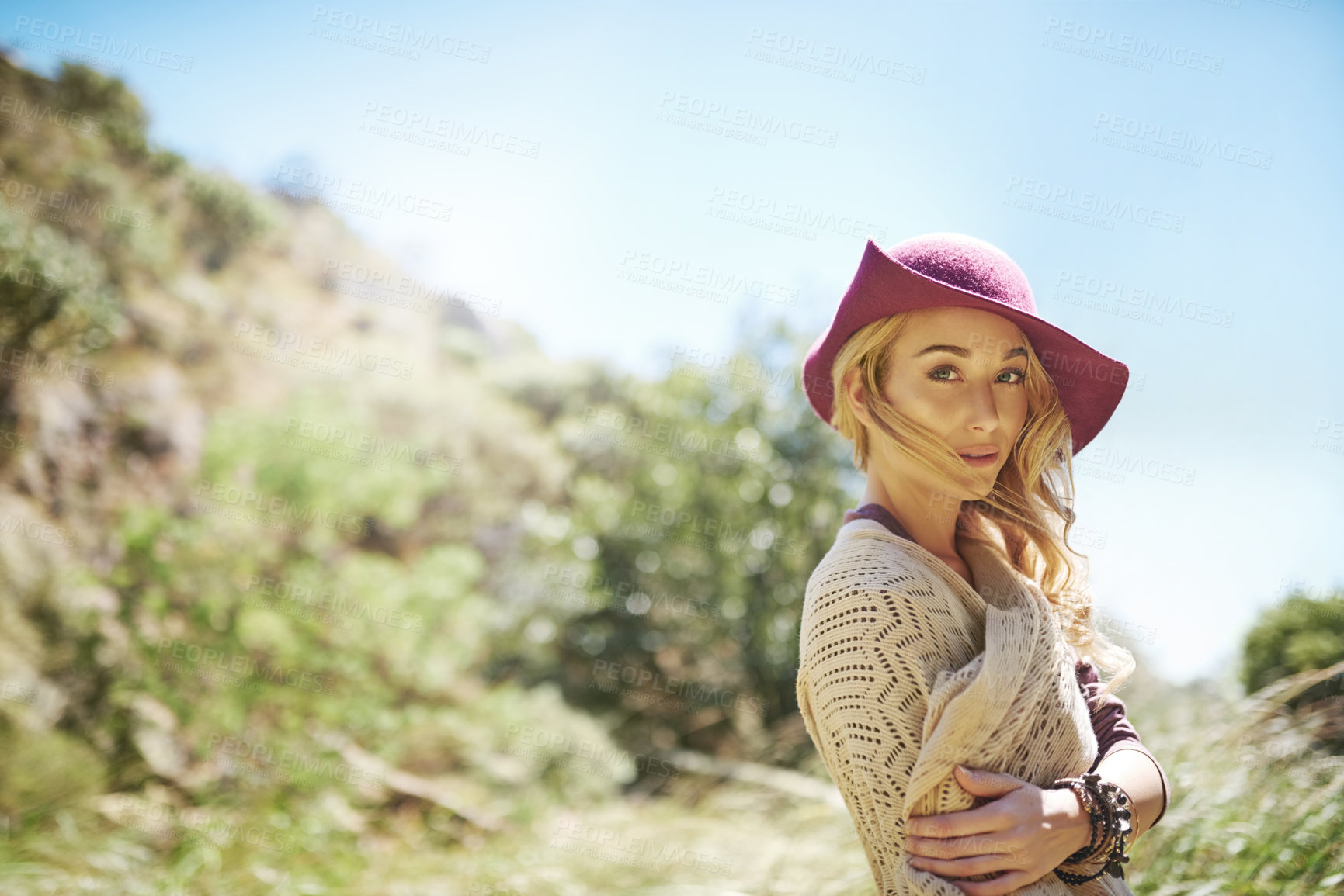 Buy stock photo Hat, adventure and portrait of woman in nature for national park tour on vacation, getaway or travel. Happy, outdoor and female person in field for sightseeing journey on weekend trip in Australia.