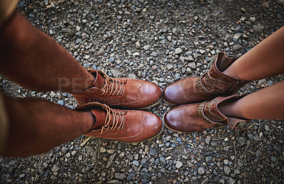 Buy stock photo Legs, above and boots on road outdoor for solidarity, bonding and activity as people in relationship. Feet, top view and shoes in street for togetherness, adventure and connection with leather