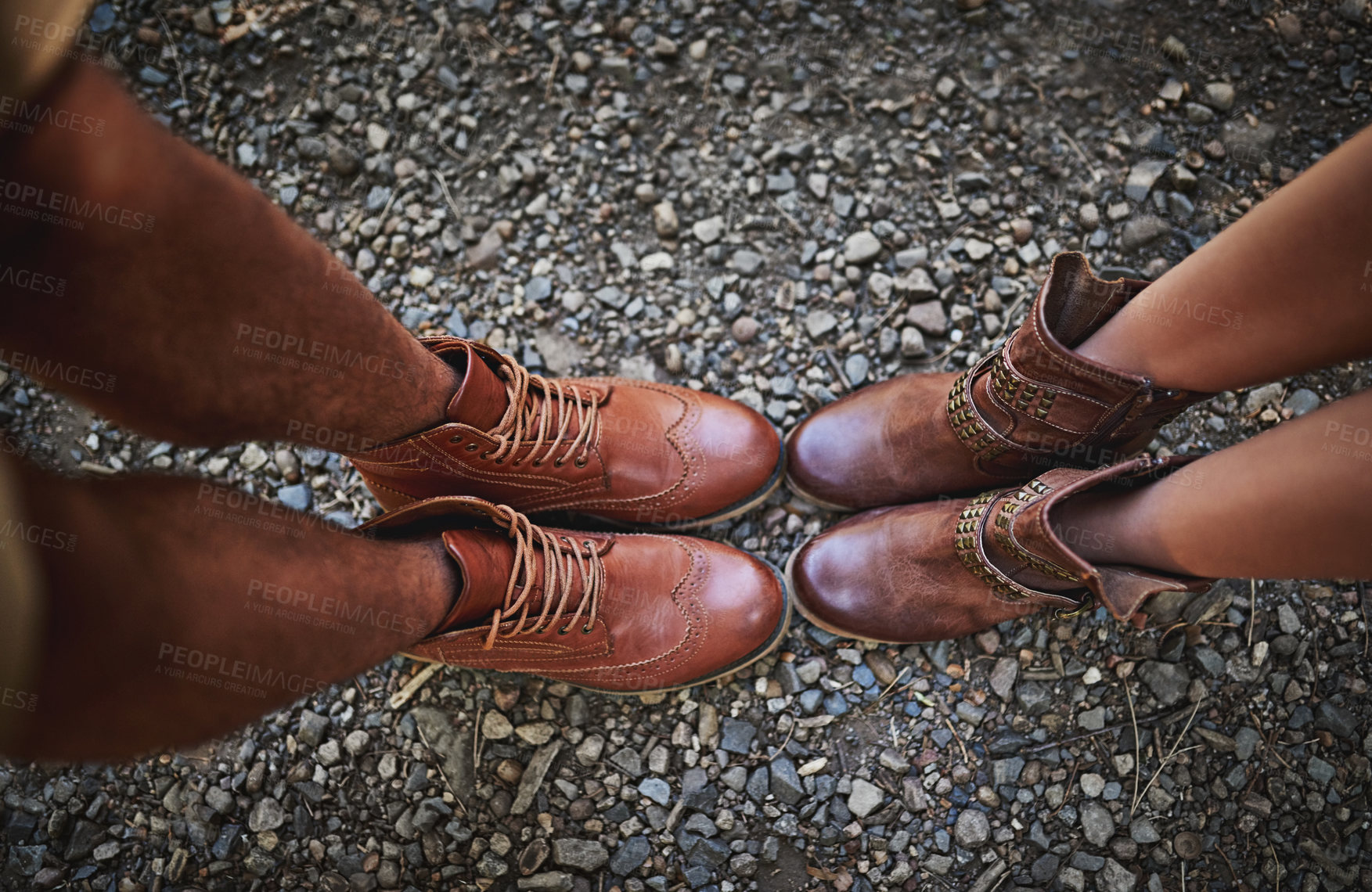 Buy stock photo Legs, above and boots on road outdoor for solidarity, bonding and activity as people in relationship. Feet, top view and shoes in street for togetherness, adventure and connection with leather