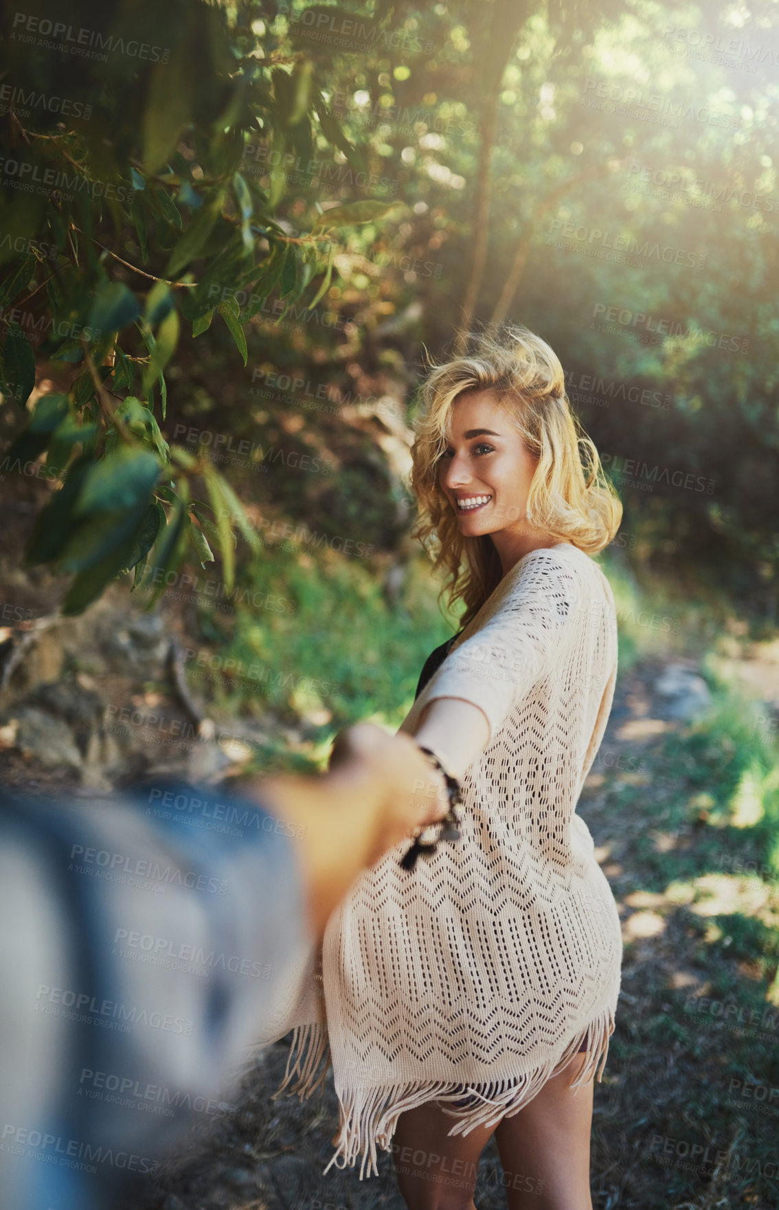 Buy stock photo Couple, outdoor and happy with holding hands in forest to explore nature with bonding and care in Thailand. People, relationship and smile in woods on trip or journey for holiday and adventure