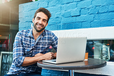Buy stock photo Man, portrait and laptop at coffee shop as freelancer or content creator for travel blog, city or influencer. Male person, face and smile at street cafe in Italy for writing, article or brick wall