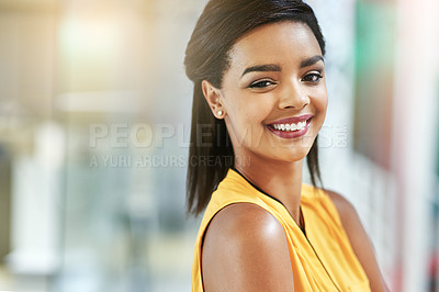 Buy stock photo Portrait of a smiling young woman working in an office