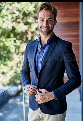 Buy stock photo Portrait of a young businessman standing outside an office