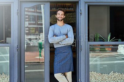 Buy stock photo Cropped shot of a handsome young cafe owner