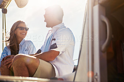 Buy stock photo Couple sailing on yacht, summer and travel with vacation at sea, love and commitment with lens flare, sun and happiness. Man, woman and relationship, marriage and honeymoon in Italy with holiday