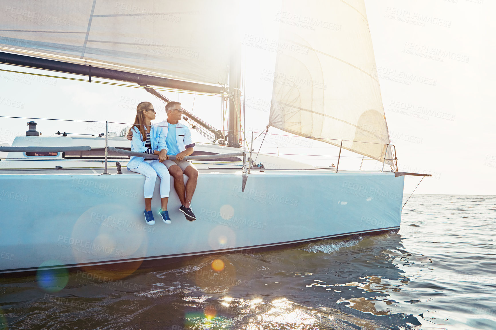 Buy stock photo Travel, love and couple on boat by ocean for vacation, getaway or weekend trip for romantic date. Journey, sailing and mature man and woman on yacht for holiday adventure together by sea at sunset.