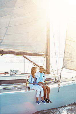 Buy stock photo Couple, boat and adventure at sea for holiday during summer to relax on luxury or rich cruise. Ocean, vacation and people on yacht for outdoor travel and freedom to enjoy the sunshine together.
