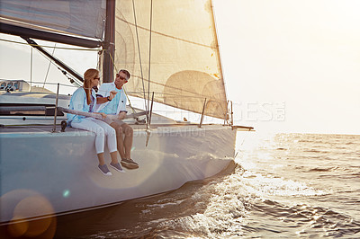 Buy stock photo Relax, travel and luxury with couple on yacht for summer, love and sunset on Rome vacation trip. Adventure, journey and vip with man and woman sailing on boat for ocean, tropical and honeymoon at sea