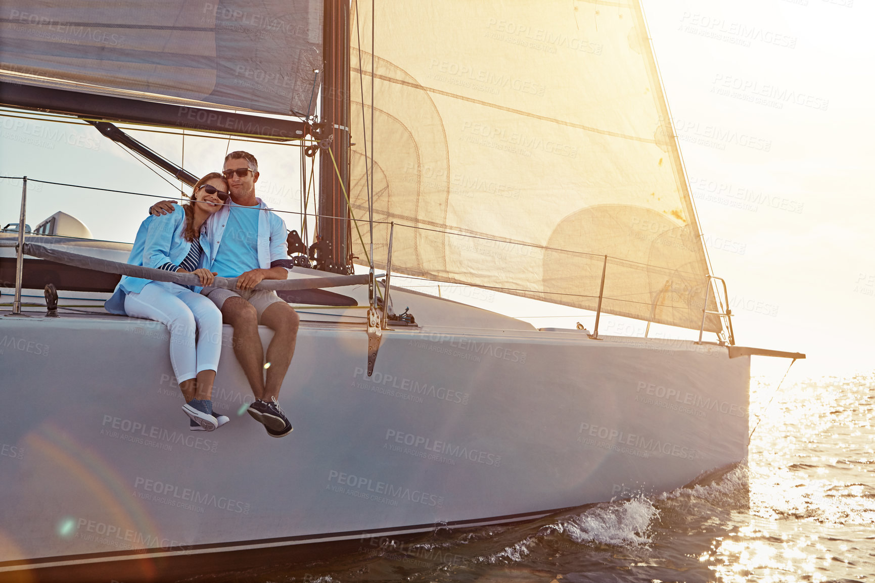Buy stock photo Sea, relax and couple hug on yacht for travel, vacation or holiday with love or adventure in Greece. Outdoor, paradise and people on boat in ocean or beach for tropical honeymoon trip and journey