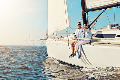 Buy stock photo Yacht, travel or love and a mature couple sitting on a boat out at sea with blue sky mockup and flare. Ocean, summer and luxury with a man and woman on a ship to relax on the water in nature