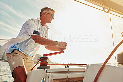 Buy stock photo Retirement, luxury yacht and investment for mature man and sailing winch in mast control, wind management or speed. Person, tourism boat and rope handle in wealth holiday and water location vacation