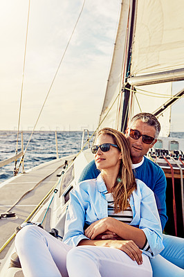 Buy stock photo Retirement, investment and luxury with couple on yacht for summer, relax and wealth on Bali trip. Travel, love and ship with baby boomers man and woman sailing on boat for tropical vacation at sea