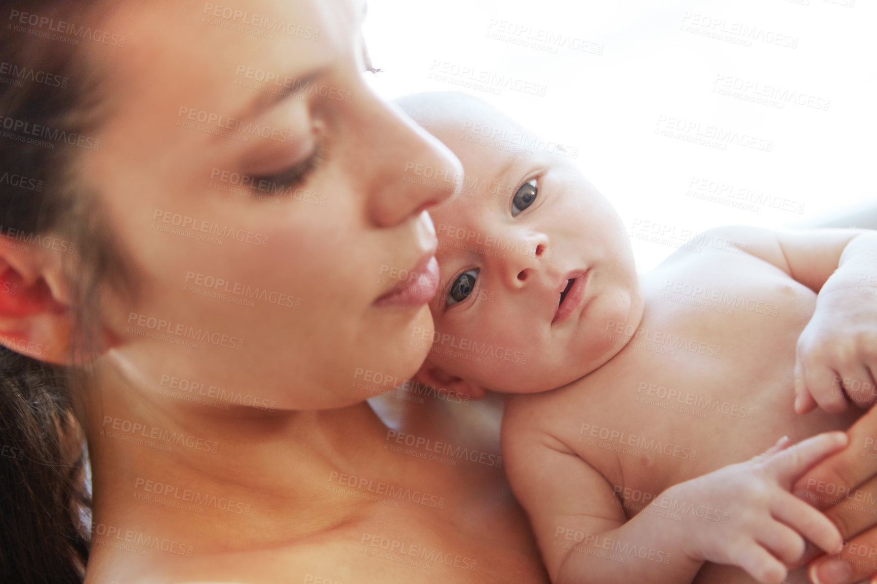 Buy stock photo Closeup shot of a mother holding her newborn baby