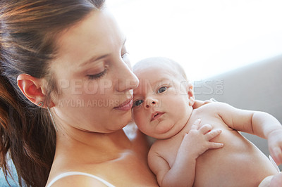 Buy stock photo Closeup shot of a mother holding her newborn baby