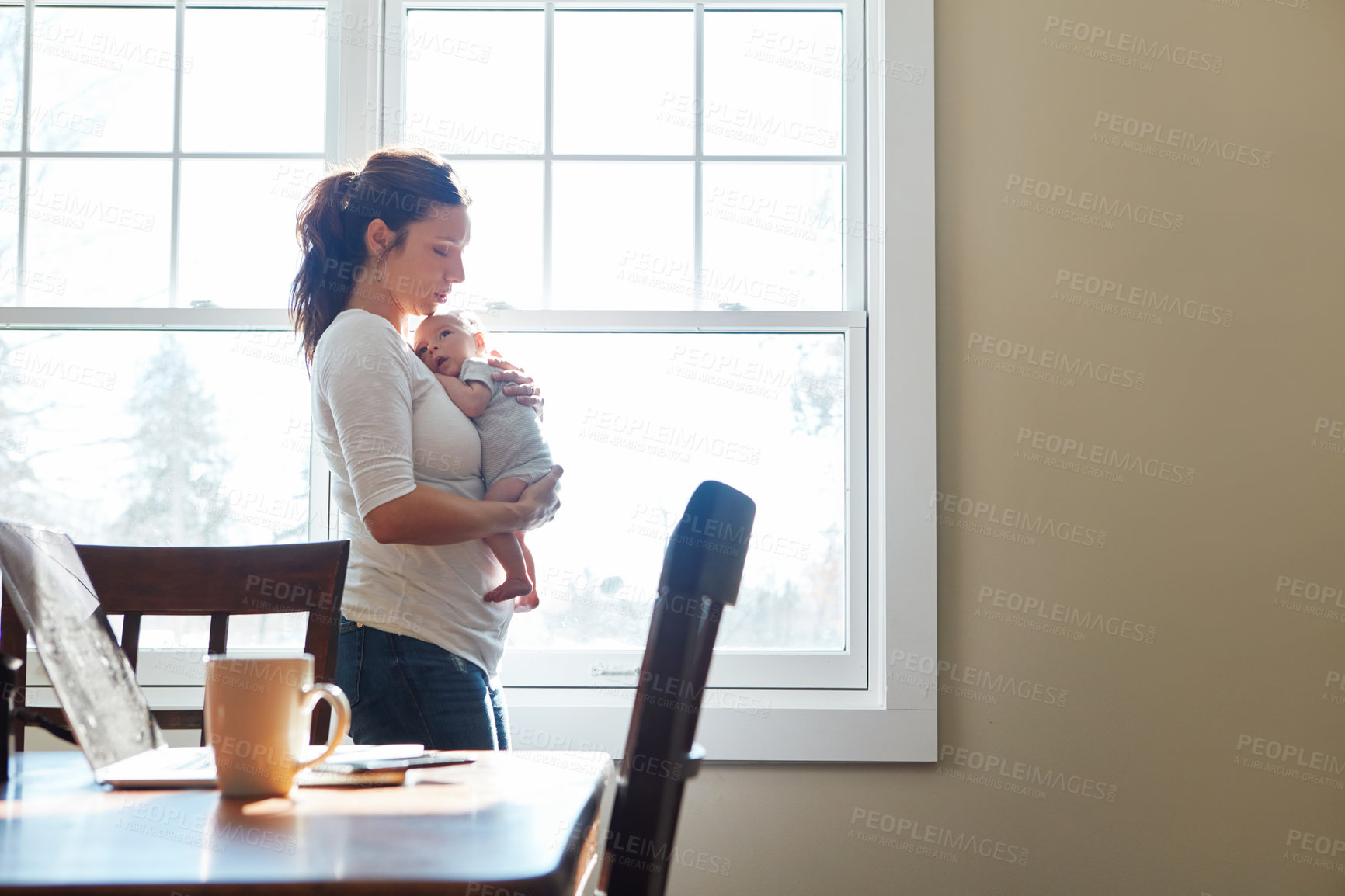 Buy stock photo Shot of a mother holding her newborn baby