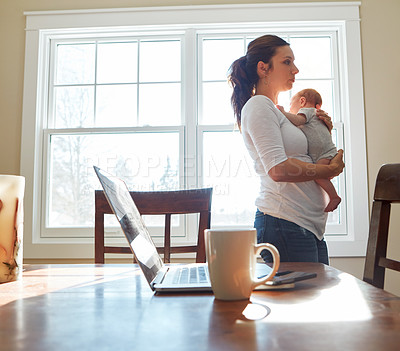 Buy stock photo Shot of a mother holding her newborn baby