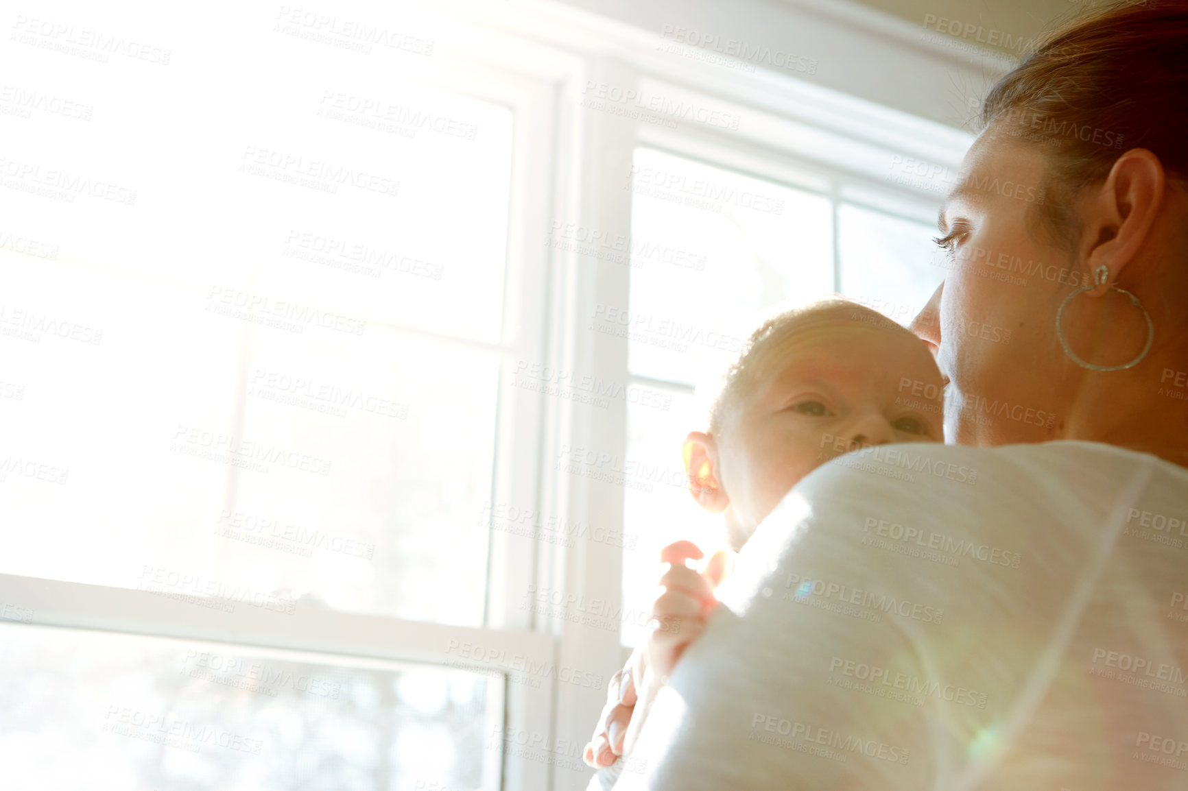 Buy stock photo Shot of a mother holding her newborn baby