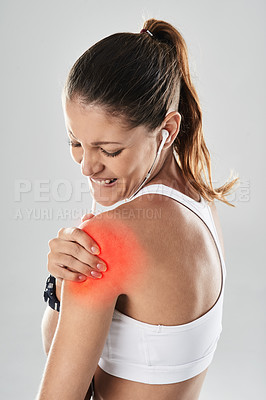 Buy stock photo Woman, shoulder and pain in red at studio from training, fitness and muscle injury as athlete. Fit, female person and glow for medical disease with joint arthritis from sports accidents for care