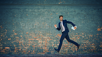 Buy stock photo Brick wall, business and man running, speed and corporate professional with appointment. City, person and employee with movement and late for meeting and consultant with energy, startup or confidence
