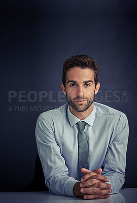 Buy stock photo Portrait, man and confident with business in dark background with corporate growth and opportunity at law firm. Lawyer, table and satisfied with company or career progress as entrepreneur in studio