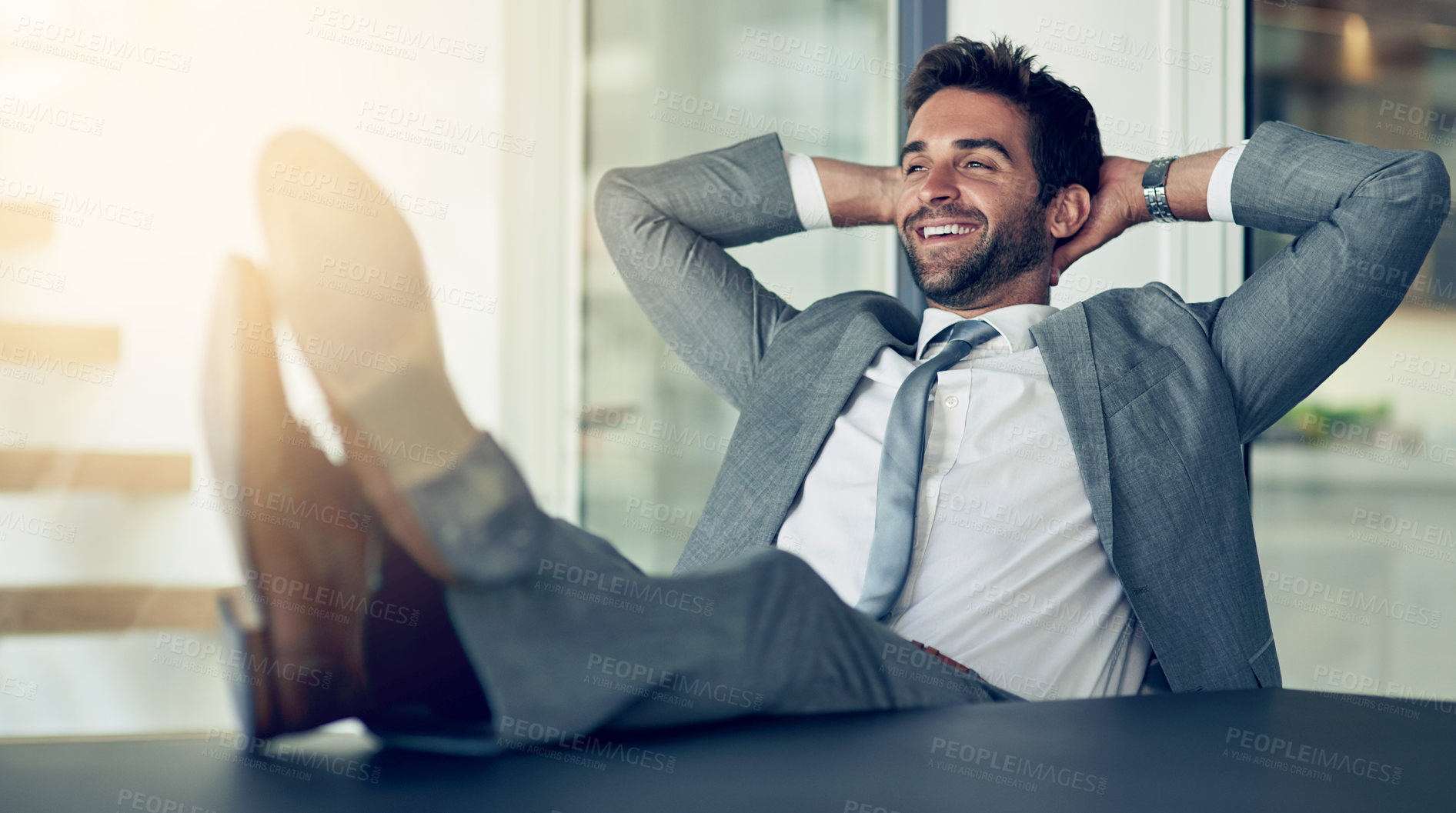 Buy stock photo Relax, success and businessman with hands behind his head after finished project in the office. Rest, calm and happy professional male employee on a break with an achievement task in the workplace.