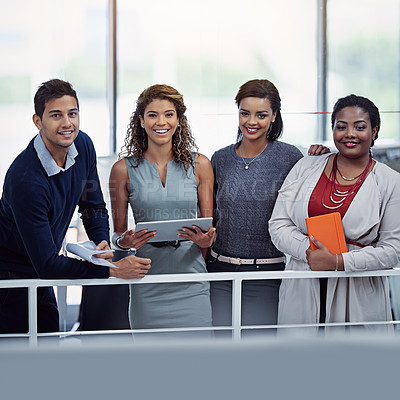 Buy stock photo Portrait of a group of smiling colleagues working together in an office