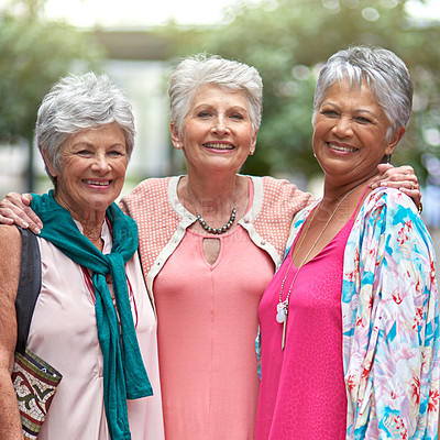 Buy stock photo Cropped portrait of a three senior women out on a shopping spree