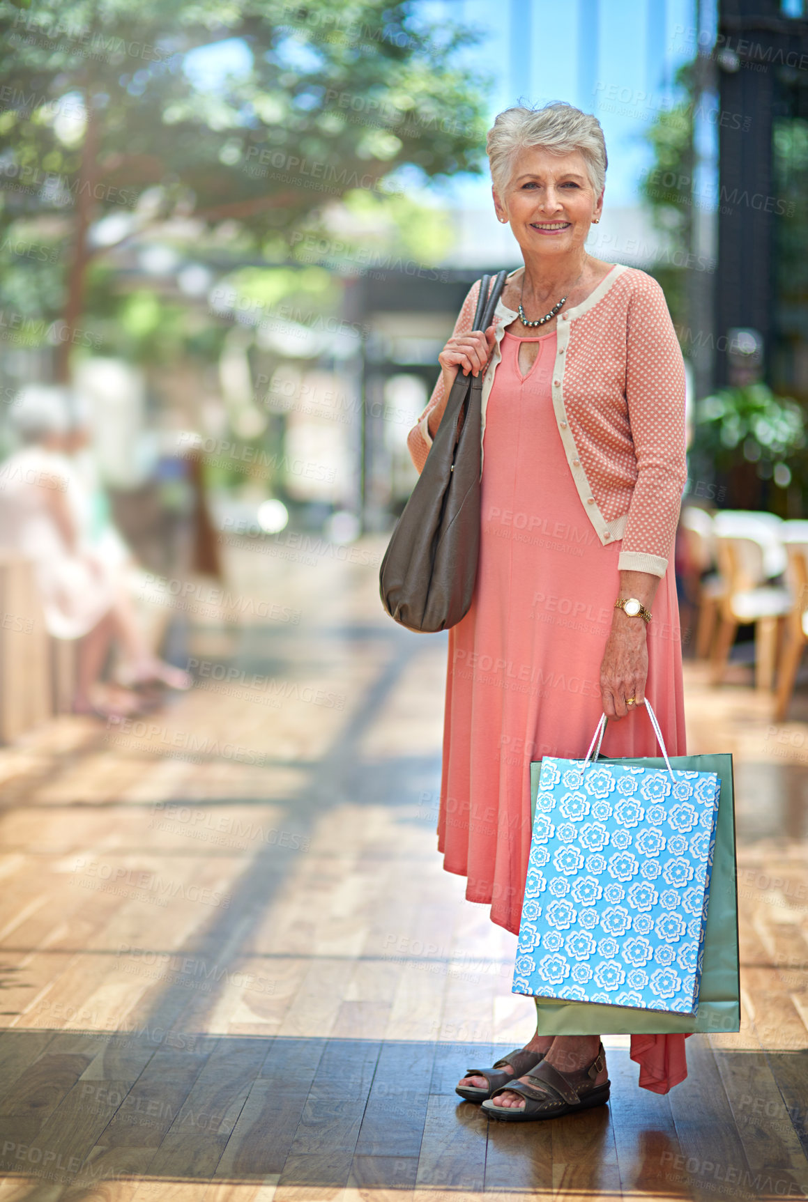 Buy stock photo Full length portrait of a senior woman out on a shopping spree