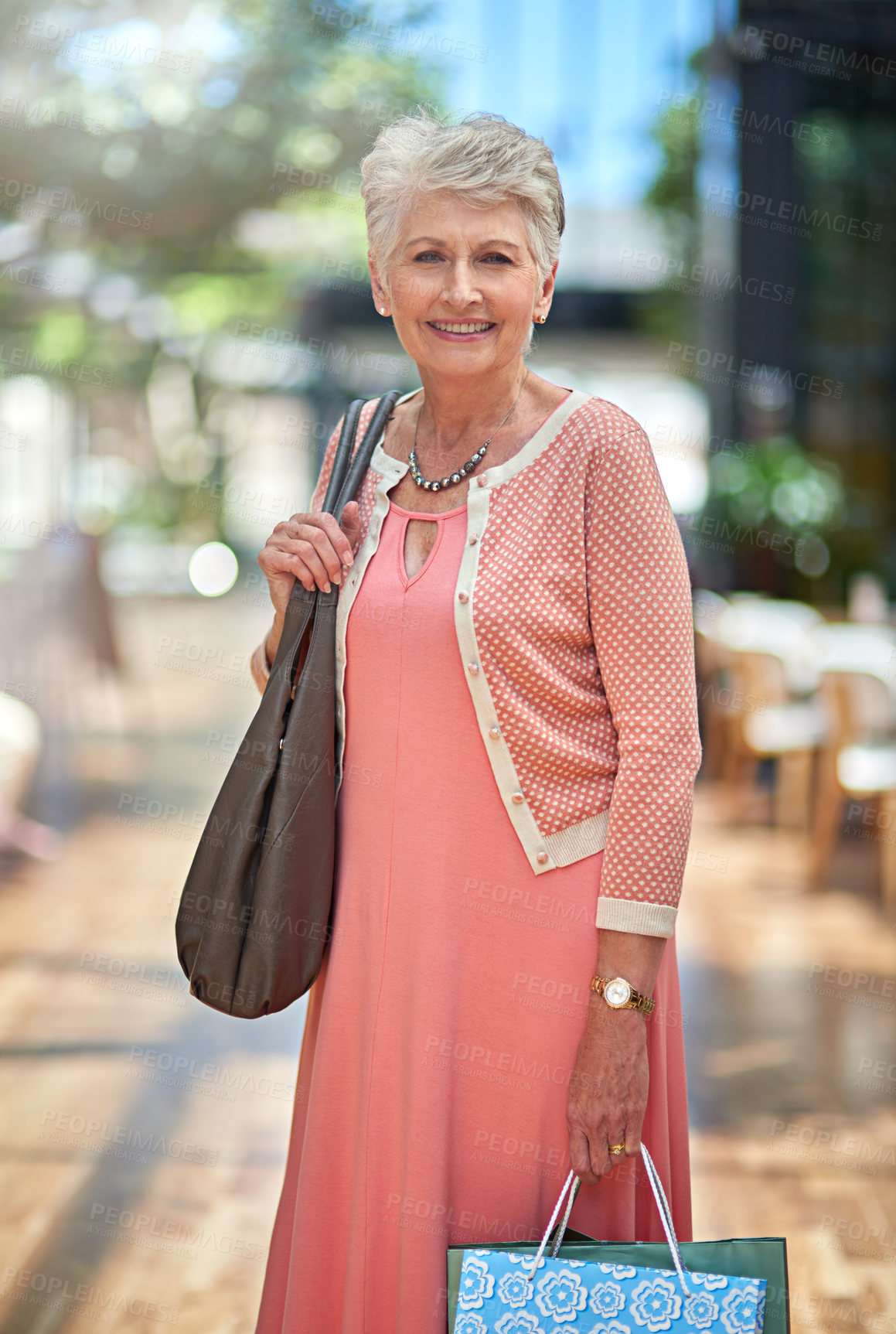 Buy stock photo Cropped portrait of a senior woman out on a shopping spree