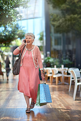 Buy stock photo Full length shot of a senior woman out on a shopping spree