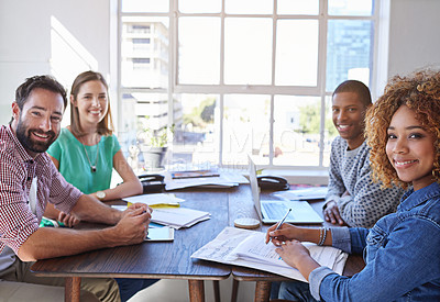 Buy stock photo Cropped portrait of a young design team sitting in the boardroom