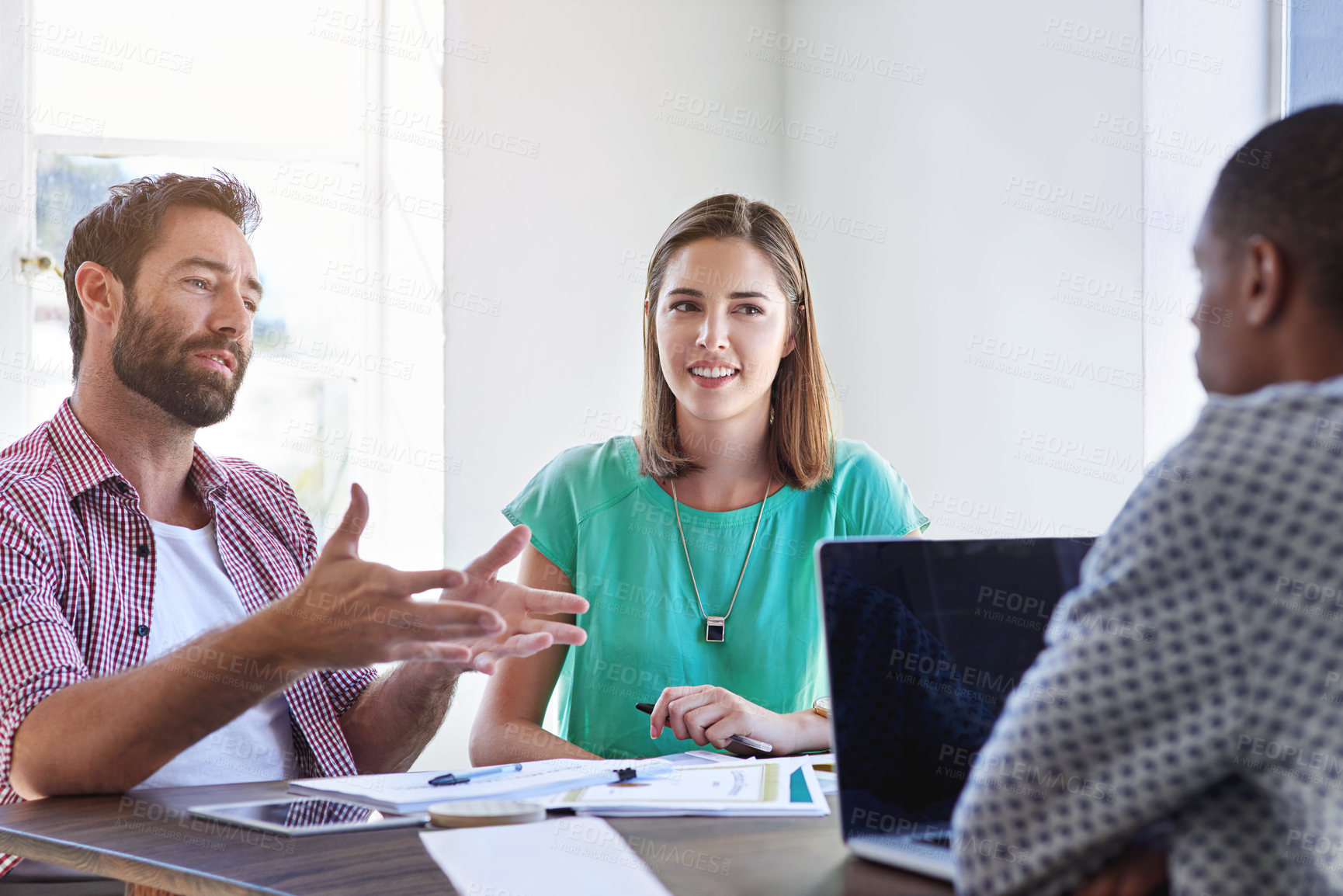 Buy stock photo People, team and meeting at startup, discussion or smile with documents, strategy and review at small business. Group, men and women with laptop, feedback and happy with diversity at creative agency