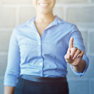 Buy stock photo Cropped shot of a businesswoman connecting to a user interface with her finger