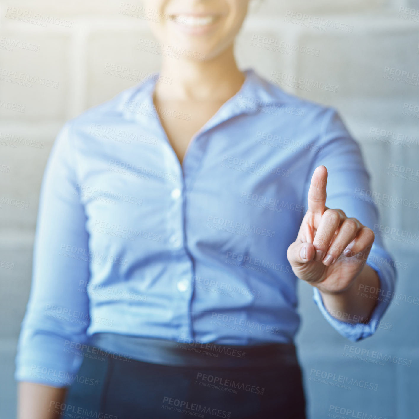 Buy stock photo Cropped shot of a businesswoman connecting to a user interface with her finger