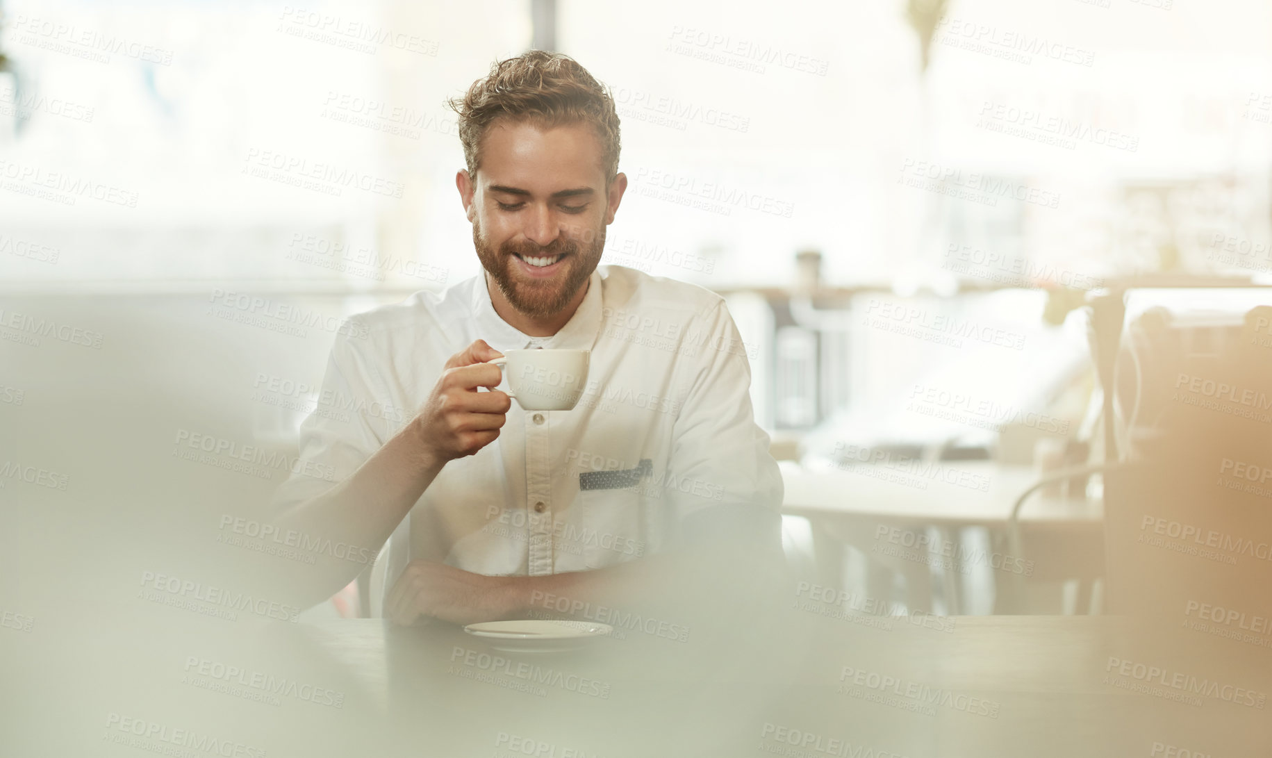 Buy stock photo Man, smile and restaurant with drinking coffee in small business for relax in hospitality on break. Male person, happy and cafe in work, management and development for menu or recipe as entrepreneur