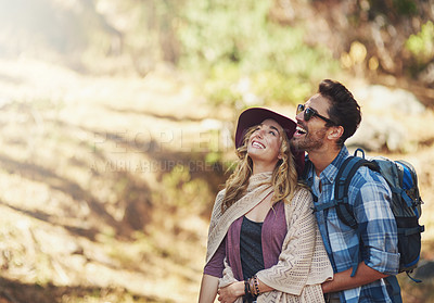 Buy stock photo Cropped shot of an affectionate young couple during a hike