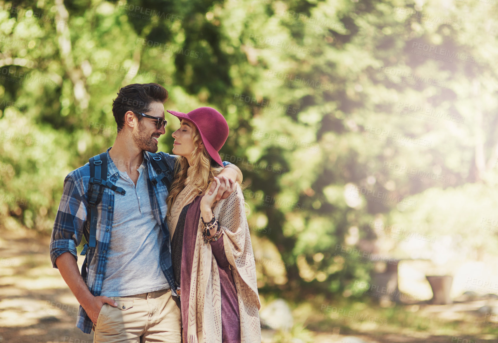 Buy stock photo Cropped shot of an affectionate young couple during a hike