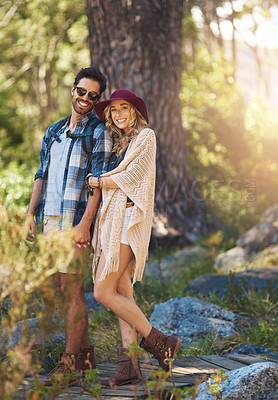 Buy stock photo Full length portrait of an affectionate young couple during a hike