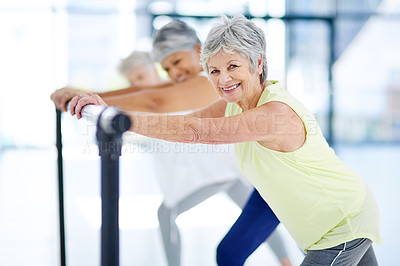Buy stock photo Shot of three senior women working out indoors