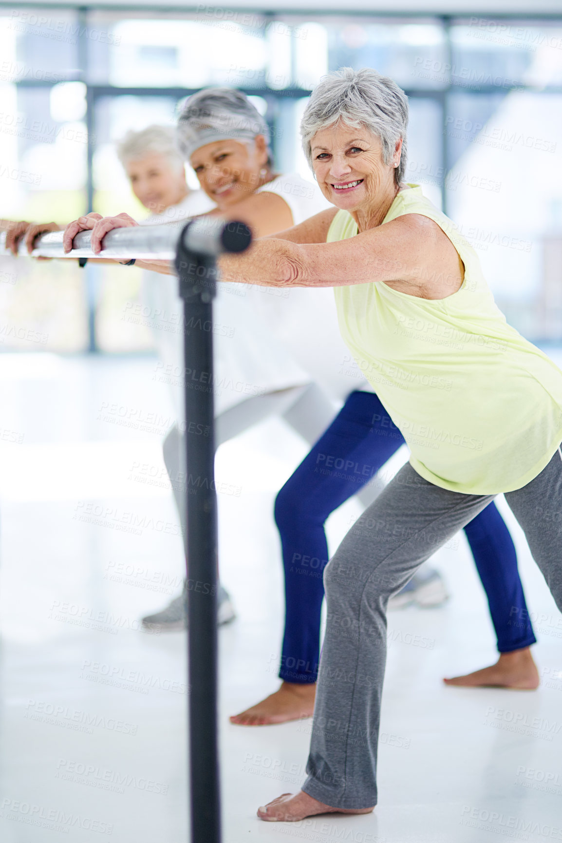 Buy stock photo Shot of three senior women working out indoors