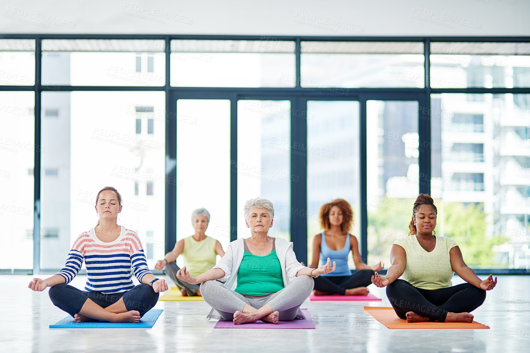 Buy stock photo Yoga, meditation and women in class on floor for wellness, healthy mindset and balance in studio. Retirement, friends and mature people for exercise, breathe and pilates for mindfulness, zen and calm