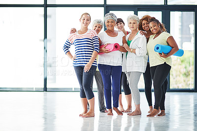 Buy stock photo Shot of a group of women waiting for yoga class to begin