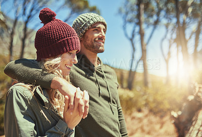 Buy stock photo Cropped shot of an affectionate young couple hiking