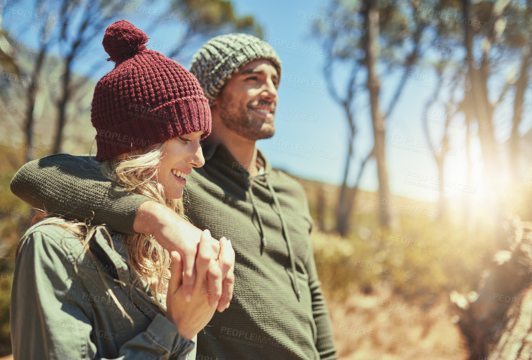 Buy stock photo Cropped shot of an affectionate young couple hiking