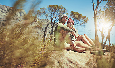 Buy stock photo Hiking, happy couple or relax in nature on vacation, holiday or adventure together in forest. Smile, man and woman resting after trekking outdoor for travel, tourism or hug on date for love or care