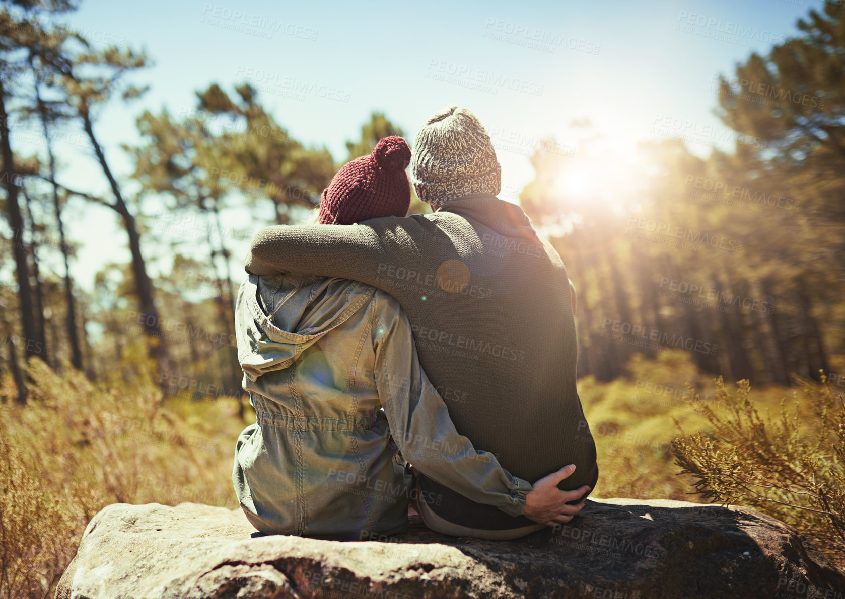 Buy stock photo Couple, hug and back for hiking outdoor with fitness adventure, travel location or romantic nature. People, embrace and support for cardio exercise, calm morning and bonding of forest view in summer