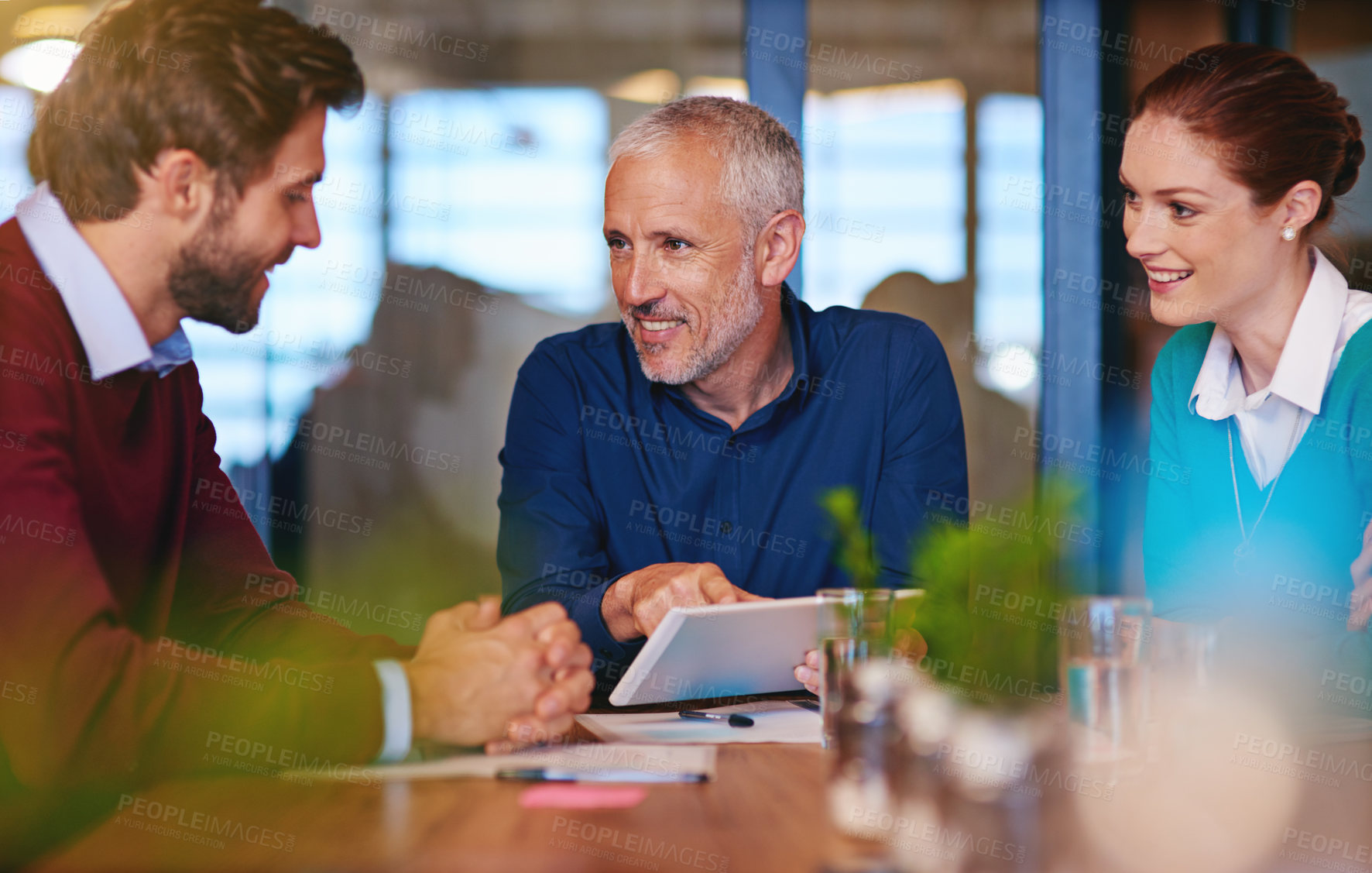 Buy stock photo Investment, meeting and business people with tablet in office for stock market, info and forecasting. Happy, employees and manager with tech in discussion for financial planning, feedback and advice