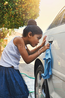 Buy stock photo Young, girl and car in cleaning with cloth in outdoor for carwash at home for chores or helping. Female child, washing and vehicle in yard for responsibility, childhood and development in working