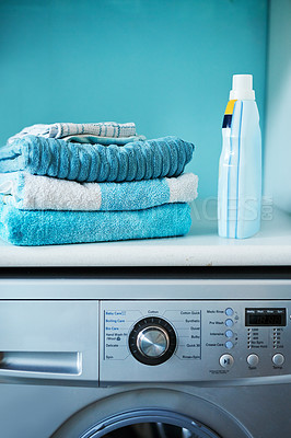 Buy stock photo Shot of a washing machine at home