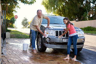 Buy stock photo Portrait, family and washing car with water, cloth and weekend chores on driveway. Cleaning transport, outdoor and father with smiling young daughter with soap, together and happy for helping routine